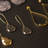 Pendientes plumb gold